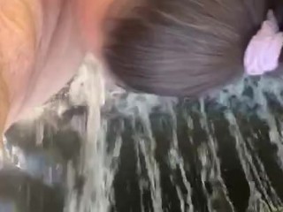 'She sucks his cock by a waterfall'