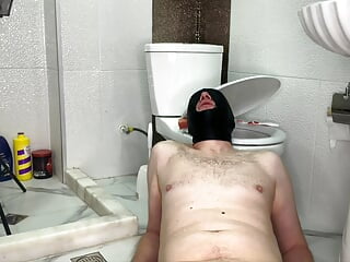 Dominatrix Nika fucked her slave who was cleaning the toilet. After pegging, she pissed in his mouth.